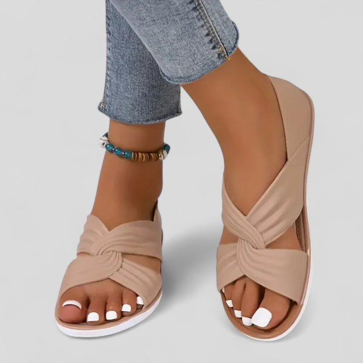 Women's Open Toe Flat Sandals with Twisted Crossover Straps and Closed Heel