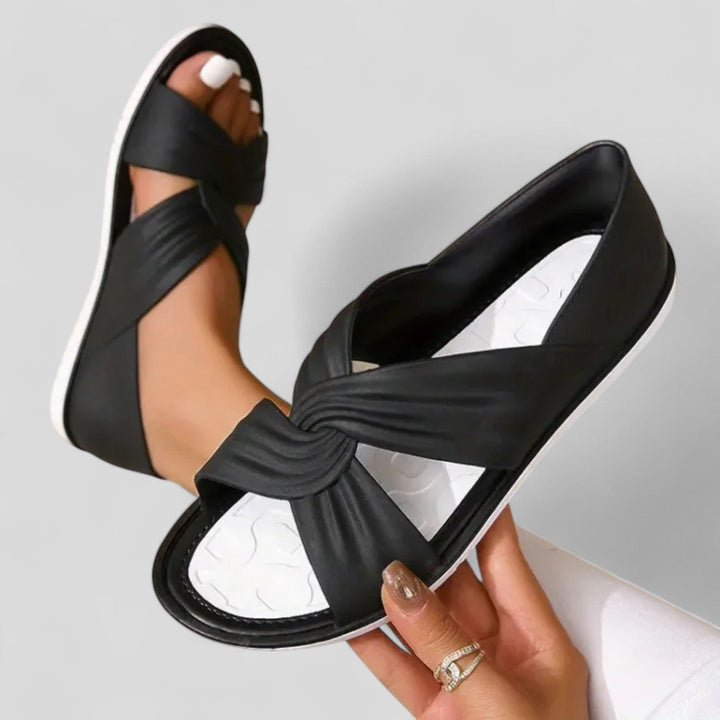 Women's Open Toe Flat Sandals with Twisted Crossover Straps and Closed Heel