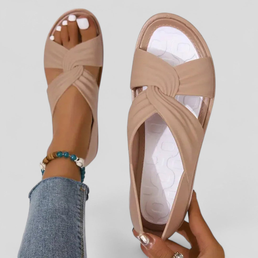 Women's Open Toe Flat Sandals with Twisted Crossover Straps and Closed Heel