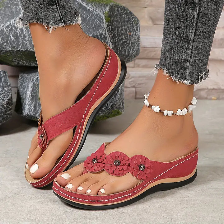 Women's Open Toe Wedge Flip Flop Sandals with Floral Toe Post Detail