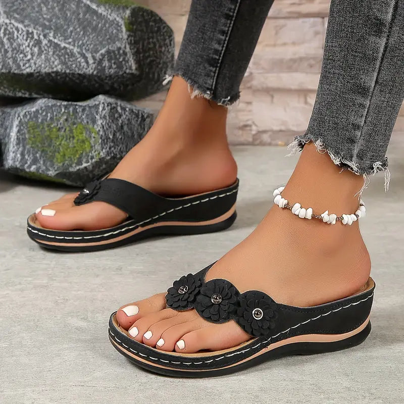 Women's Open Toe Wedge Flip Flop Sandals with Floral Toe Post Detail