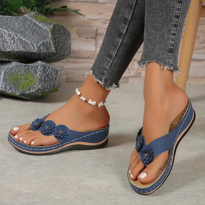 Women's Open Toe Wedge Flip Flop Sandals with Floral Toe Post Detail